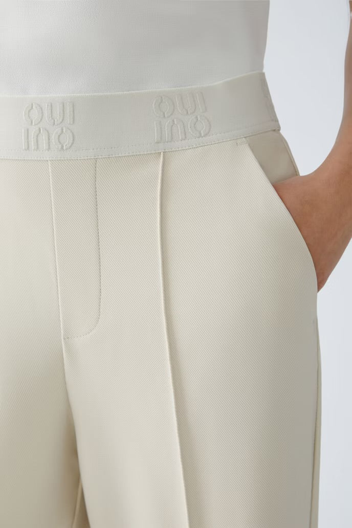 Cream elasticated trousers
