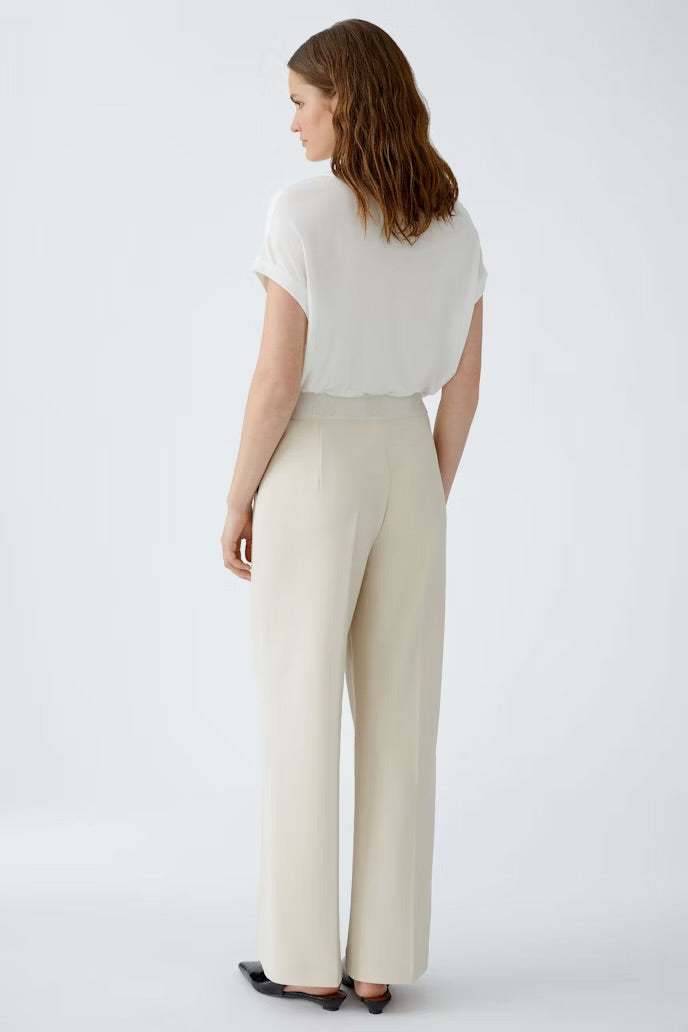 Cream elasticated trousers